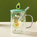 Clear glass mug with green avocado lid, reusable straw, and cute cartoon bear illustration - Avocado / Single Mug