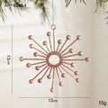 Sparkling rose gold glitter starburst Christmas tree ornament hanging on pine branch - Snowflake B