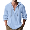 Détail d'une chemise à capuche en lin bleu clair avec trois boutons et cordon noir - S / Hauts / Bleu clair