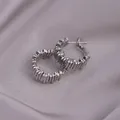 Silver corrugated gear hoop earrings with stacked rectangular plates on silk background - E-073---Platinum
