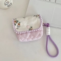 Floral and checkered cotton CCD camera storage pouch with a purple lanyard on a desk - Floral Orange + Pink Stripes