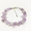 Detailed macro view of amethyst natural stone bracelet with adjustable silver lobster clasp - Purple Jade