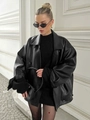 Giacca oversize in pelle nera da donna con silhouette vintage e finitura lucida - S / Nero