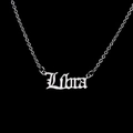 Detailed close-up of Libra zodiac pendant in Gothic font on stainless steel chain - Libra-Silver