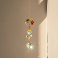 Detail of brass heart tree of life suncatcher with crystal creating rainbow light - Brass Heart Tree of Life