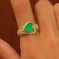 Detailed shot of a gold heart-shaped watch ring with green dial and textured metal band - Gold Green Heart Face (2283)