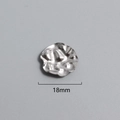 Detailed macro view of 18mm silver vintage hammered stainless steel round pendant - Hammered Round Pendant (P00076S)