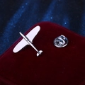 Classic silver airplane brooch pin with metal butterfly clutch on red velvet surface - Silver Smooth Fighter Jet
