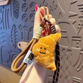 Cute croissant plush keychain with woven strap and brown metal carbine clip - Plush Food-Croissant