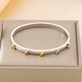 Polished silver stainless steel bangle with gold and rose gold X cross motifs - Silver Cross X Symbol Cuff Bracelet (KB184845-SP)