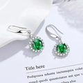 Silver drop earrings featuring circular green emerald-colored stones with diamond halo decor - Green Diamond Four-prong Round Earrings Led-98