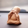 Miniature smiling monk bobblehead car ornament in light brown resin, 6x4x7cm size - Cheek Pinch (Mini Size)
