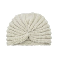 Bohemian cream white knitted turban hat with vintage knot design and thick ribbed texture - One Size / Beige