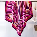 Detailed close-up of pink silk scarf with abstract geometric lines and vibrant patterns - Pink Abstract Geometric (FN127-1)