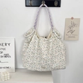Detailed view of chiffon floral tote bag with lavender handle and floral patterns - Jacquard Blue Cherry