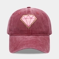 Close-up of vintage burgundy washed cotton baseball cap with pink diamond patch detail - Burgundy