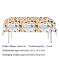 Western cowboy themed disposable tablecloth with cow print pattern and cowboy hat graphics - Tablecloth