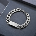 Macro detail of silver Cuban chain bracelet with blank metal ID plate on jewelry box - 3.0 (44x12mm Plate/12mm Width/20cm Length)