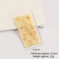 PVC realistic large rectangular cookie keychain charm in light yellow with wavy edges - Baked Soda Biscuit Model
