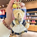 Plush teddy bear keychain wearing blue plaid dress and white apron with yellow bell - Brown Striped Bear (Girl)