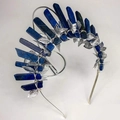 Detailed view of handmade silver crown featuring blue gemstones and delicate metal leaves - Lapis Lazuli Silver Wire Silver Leaves