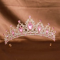 Luxurious gold bridal crown with pink water-drop rhinestones on silk background - Gold Pink
