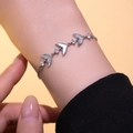 Bracciale regolabile a coda di pesce in argento da donna con zirconi e madreperla bianca - Argento