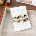 Set of two wavy tortoiseshell acetate hair clips with premium gold metal base - 2 Pieces/Pack (6.8cm) / Beige Tortoise Shell