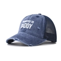 Close-up of distressed navy trucker hat with Promoted to Daddy print and mesh back - Adjustable / Navy Blue