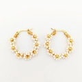 Handcrafted white beaded flower hoop earrings with elegant gold metal accents - Off White
