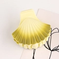 Shell-shaped hair clip with a gradient yellow and green finish on a white background - Yellow-Green Gradient