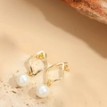 Elegant gold geometric earrings with round white pearl drop on stone surface - Hollow Quadrilateral Pearl