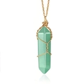 Natural green hex crystal point pendant necklace with gold wire wrap on white background - Green Aventurine