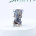 Mini Schnauzer dog figurine with blue and brown goldstone crystal inside on a white base - 46 Blue Agate