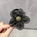 Elegant black mesh flower hair claw clip with silver glitter and golden center detail - Mesh Rhinestone Flower / Black