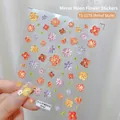 Detail of 5D embossed nail stickers featuring colorful floral daisy designs and 3D textures - TS1179 Flower in Mirror Relief
