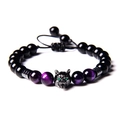 Detail of adjustable beaded bracelet with silver wolf head and tiger eye stones - Type A Obsidian + Purple Tiger Eye