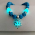 Turquoise bead yoga bracelet with luminous lotus flower pendant and glowing blue effect - Navy Blue Turquoise Cyan Glow