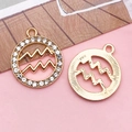 Golden Aquarius zodiac charms with white rhinestones and wavy hollow patterns for DIY jewelry - Aquarius