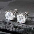 Macro shot of 8mm round cubic zirconia stud earrings with silver-tone four-prong setting - 8mm / Silver