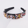 Detail of colorful rhinestones and mixed crystals on a black baroque style headband - E Black Multicolor