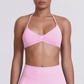 Detail of pink halter neck sports bra and high waist leggings set with seamless texture - XS / Barbie Pink