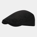 Vista lateral de la gorra plana de algodón negro que muestra el tejido de sarga y estilo retro - Ajustable / Negro