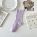 Minimalist light purple mid-tube cotton sock displayed on a white tray with aesthetic props - Light Purple