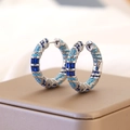 Orecchini a cerchio vintage in argento con zirconi blu e turchese texture retrò - Blu Argento
