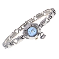 Macro detail of silver heart-link watch band with light blue dial and quartz movement - Silver/Sky Blue Dial