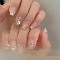Handmade minimalist cream press-on nails with French white tips and heart-shaped rhinestones - Extra Small (XS) / Minimalist Cream/Nude Pink