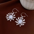 Detail of silver drop earrings with radial snowflake pattern and sparkling crystals - Silver Snowflake Fireworks Radial Diamond Style