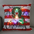 Close-up of LED Christmas pillow with glowing reindeer pattern and red stripes - Red & White Stripes Reindeer-21M-26