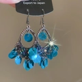 Boucles d'oreilles bohèmes en bronze avec franges de paillettes bleues et perles - Style à Franges Bleues Évidé en Bronze / Vert